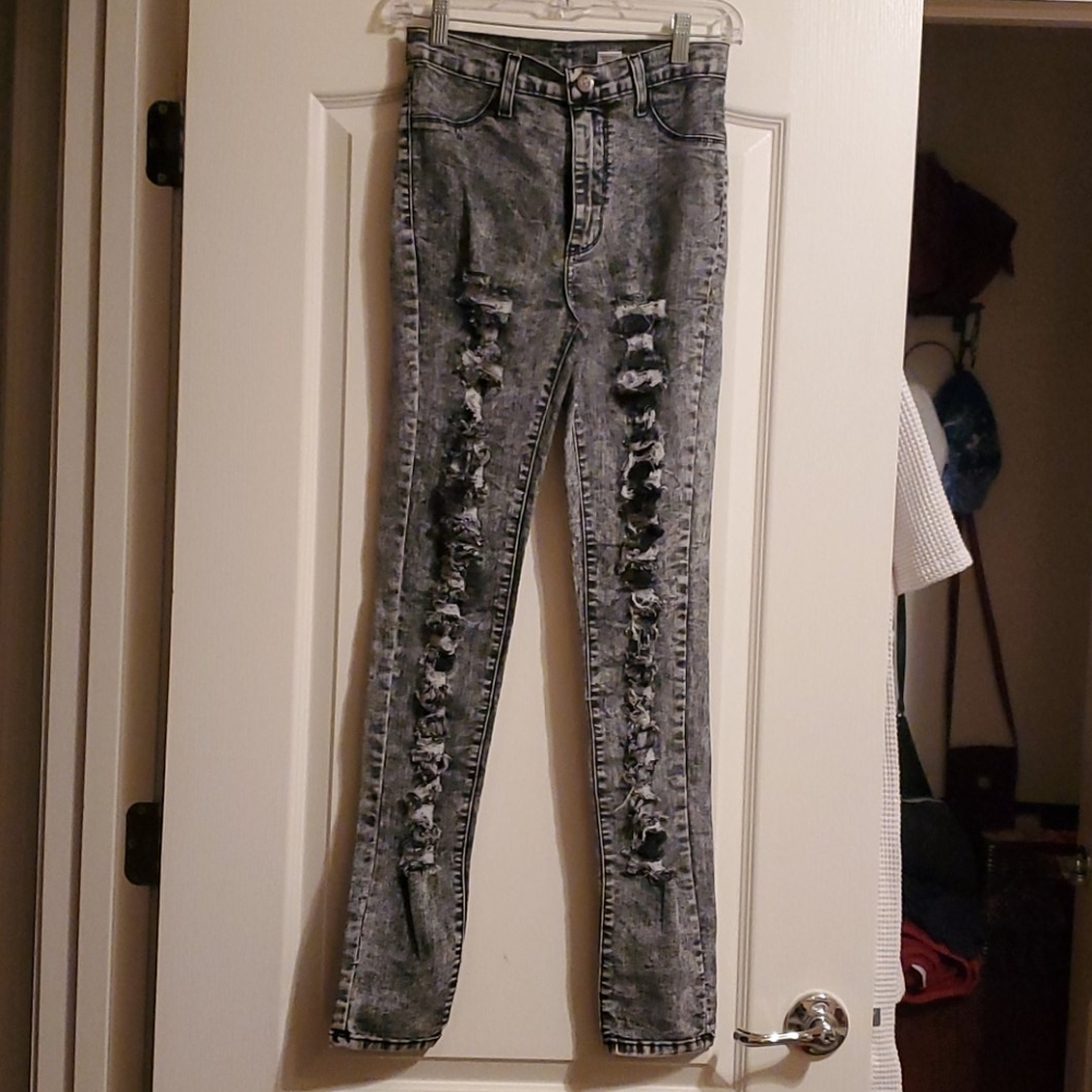 Distressed grey jeans